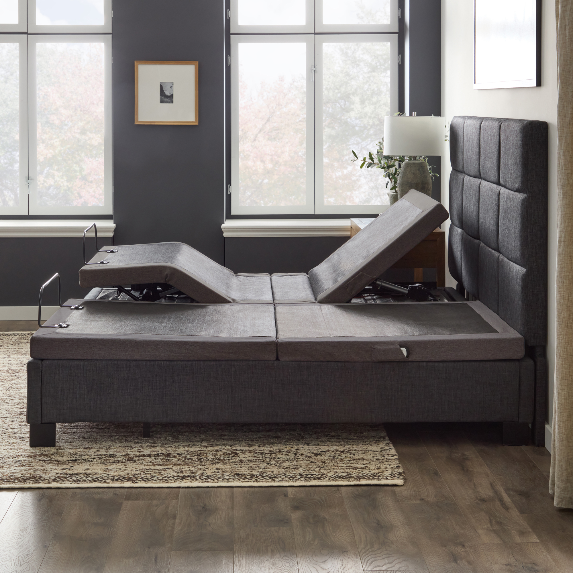 Woman laying in an elevated adjustable base