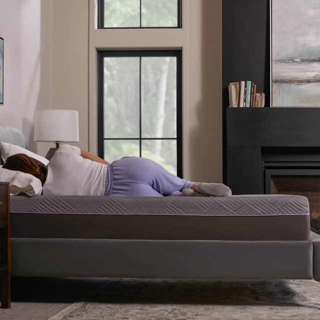 Women side laying on the Polaris Mattress